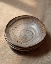 Load image into Gallery viewer, Stack of ceramic stoneware pasta bowls with a spiral design glazed in a speckle beige colour 