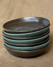 Load image into Gallery viewer, Stack of ceramic plates with brown and blue glaze on a beige surface
