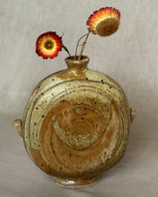 Load image into Gallery viewer, Ceramic stoneware vase with fluid glazing containing dried flowers on a neutral background