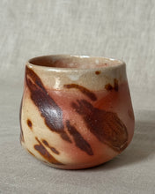 Load image into Gallery viewer, Woodfired ceramic cup with brown marbled clay on a neutral background