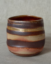 Load image into Gallery viewer, Woodfired ceramic cup made from marbled clay  on a linen background