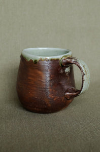 soda fired wild clay slip celedon glaze